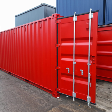 A red 20 ft storage container with doors open.
