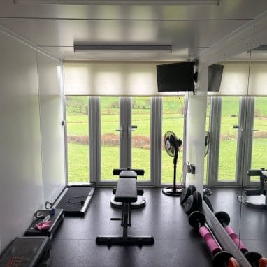 Shipping container gym - large windows